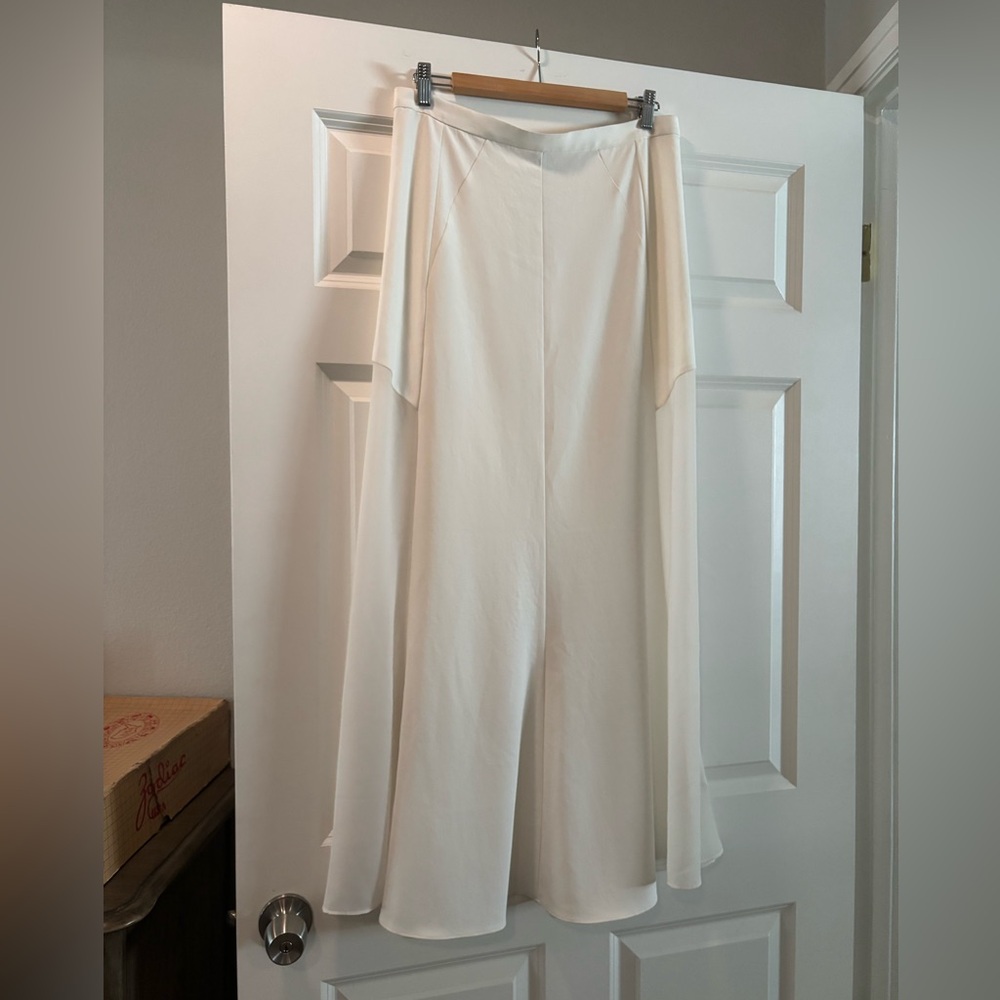 Long white maxi skirt with mesh side panels